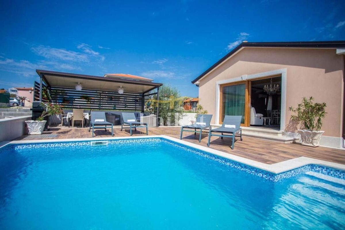 Lepo urejena pritlična hiša na veliki parceli + možnost gradnje še enega objekta